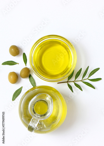 Wallpaper Mural olive oil in a bottle on a white background top view.. Vertical photo format Torontodigital.ca