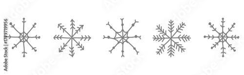 Collection of gray hand-drawn snowflakes — simple elements for festive design