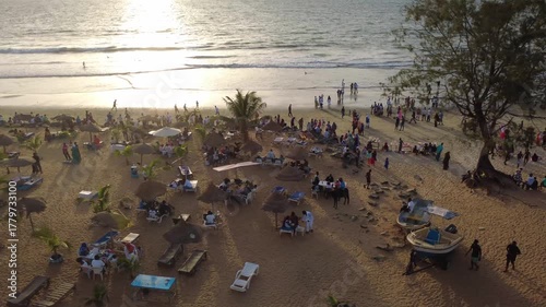 THE GAMBIA - 10.31.2025 - Terrific aerial footage moving along the coastline of the Gambia's Senegambia Beach at sunset.