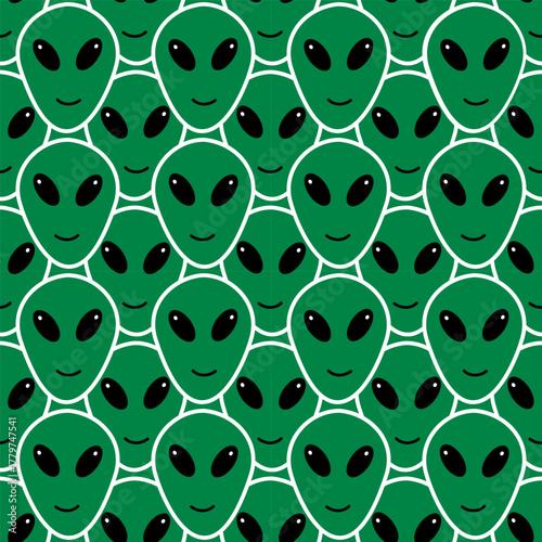 Cosmic seamless pattern with green aliens 