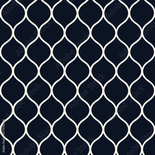 Elegant dark navy blue background with a repeating white quatrefoil geometric pattern