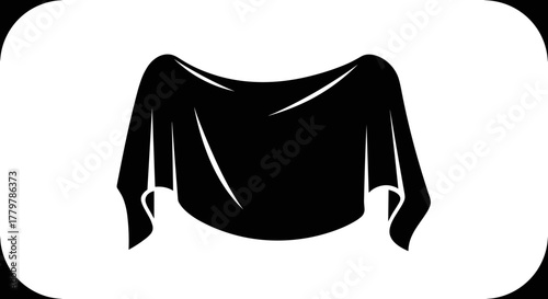 Black fabric draped over an unseen object.