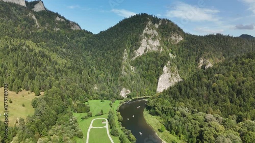 Scenic Aerial View of Czorsztyn Lake and Cycling Route in Southern Poland with Mountains, Forests and Green Valleys