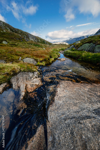 Beautiful mountain landscape with dramatic cloudy sky
