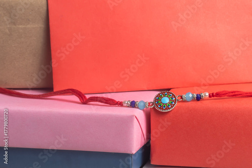 Decorative Rakhi in colorful gift boxes for celebration.