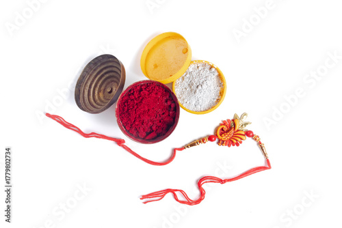 Rakhi bangles with red saffron powder in small containers for festive celebrations