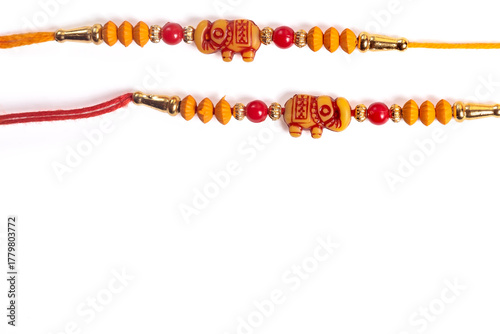 Colorful beaded rakhi bangles with elephant decorations as a festive gift