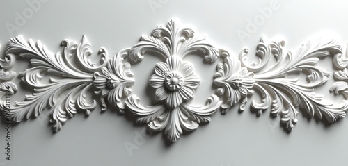 Ornate white decorative floral pattern on white background. Elegant 3D design of carved flowers and leaves. Sophisticated detailed ornament for architecture decor or wallpaper.