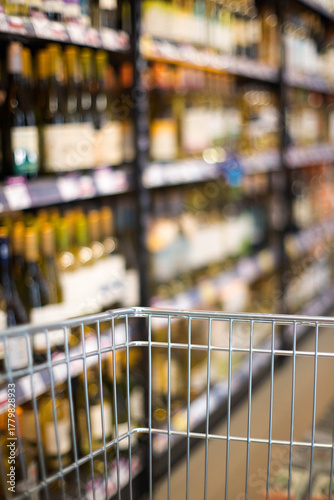 Wallpaper Mural Shopping basket in a supermarket aisle. Shopping at the supermarket.
 Torontodigital.ca