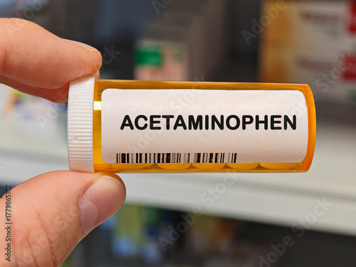 Box of ACETAMINOPHEN tablets on a hospital pharmacy table used to reduce pain and fever an analgesic and antipyretic.