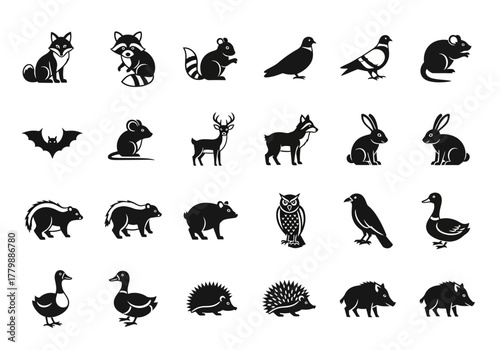 A diverse set of monochrome glyph icons featuring various forest and woodland animals. Vector silhouettes of wildlife for design projects