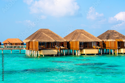 Fototapeta Naklejka Na Ścianę i Meble -  Tropical island beach landscape exotic shore coast. Tranquil closeup calm sea water waves with palm trees. Beautiful Panorama. Summer vacation, holiday amazing nature. Relax paradise, Maldives.