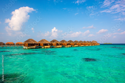Fototapeta Naklejka Na Ścianę i Meble -  Tropical island beach landscape exotic shore coast. Tranquil closeup calm sea water waves with palm trees. Beautiful Panorama. Summer vacation, holiday amazing nature. Relax paradise, Maldives.