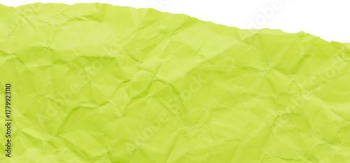 Ripped edge of acid green crumpled paper, isolated textured scrap for collage in bright colors