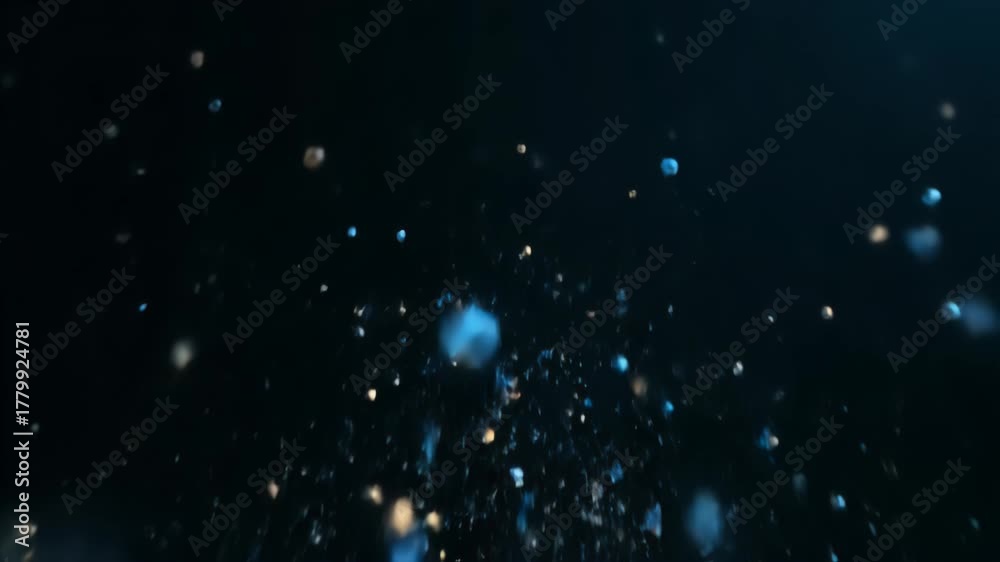 Abstract Explosion of Blue White and Gold Particles Against a Dark Background Representing Cosmic Events or Data Visualization