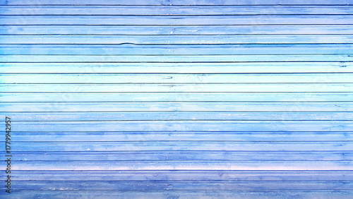 Tableau sur toile Top view of blue background wooden planks board texture.