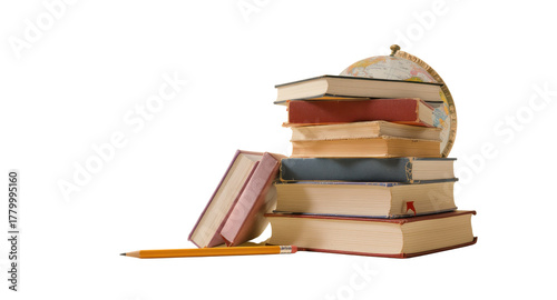 Vintage educational still life with a stack of old books a world globe and a pencil.