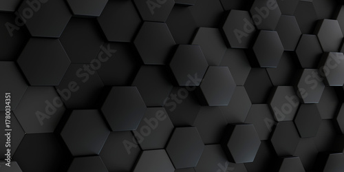 A captivating dark abstract background featuring a three-dimensional mosaic of randomly raised and recessed hexagonal tiles in varying shades of black and charcoal gray.