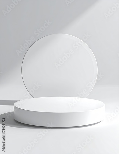 White stage. Circle backdrop. Minimalist, clean aesthetic