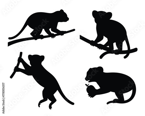 Four black kinkajou silhouettes on branches and holding fruit animal arboreal
