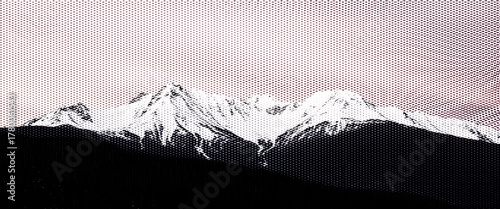 High-resolution image of a stunning snow-covered mountain landscape featuring a winter panorama of alps under a blue sky, with glistening ice and a majestic peak.