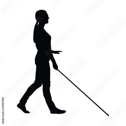 Silhouette of a Blind Woman Walking, Using a Long Cane for Mobility and Guidance.