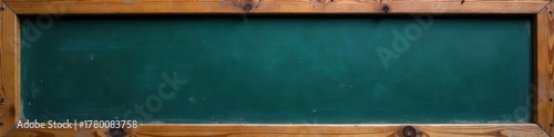 Rubbed-out dirty chalkboard; visible wood frame , surface, school supplies