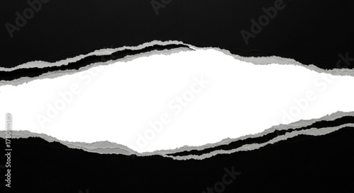 Fototapeta Naklejka Na Ścianę i Meble -  Torn paper black background with white space for text and design elements