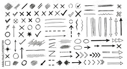 Assortment of handdrawn sketch elements including arrows, check marks, crosses, lines, circles, and scribbles