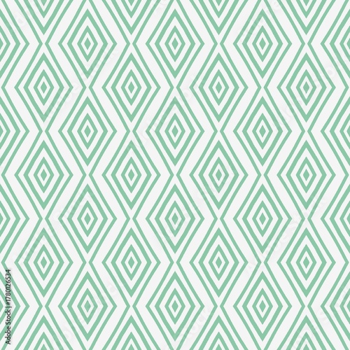Seamless geometric diamond pattern in green and white tones