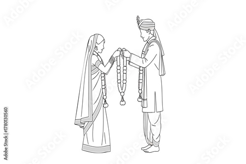 Bridal couple exchanging garlands during traditional Indian wedding ceremony, celebrating union