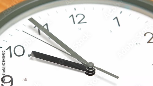 Wallpaper Mural 4K Close-up view of a round wall clock showing the time at exactly 09:55 with sharp black hands against a clean white face. Torontodigital.ca