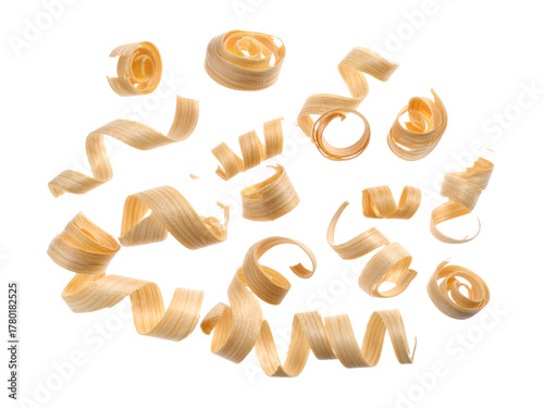 Light wooden shavings on white background, showing delicate curled wood texture, suitable for carpentry, crafts, woodworking, and design themes.