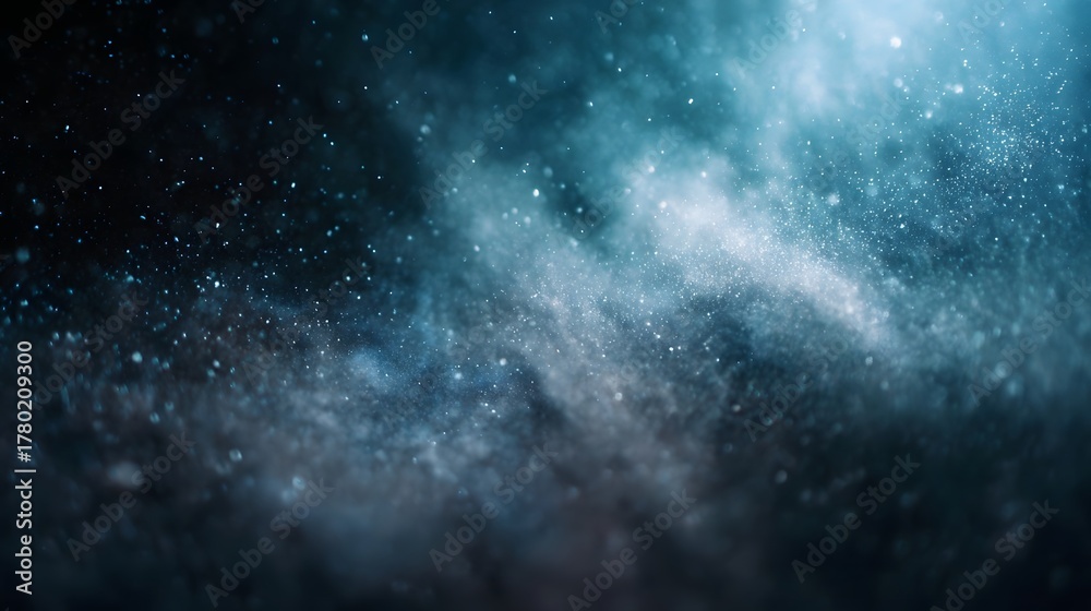 Fototapeta premium A mesmerizing view of a cosmic nebula filled with swirling clouds of dust and countless shimmering stardust particles under a deep dark sky