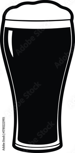 Irish Beer Black silhouette of a pint glass filled with dark stout beer and foamy head on white background