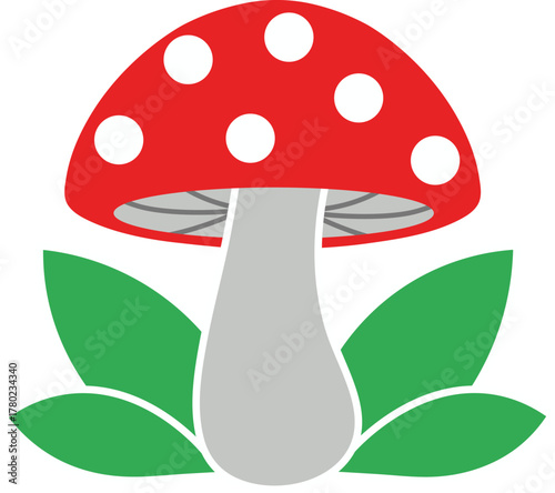 Red and white spotted mushroom with green leaves toadstool spots