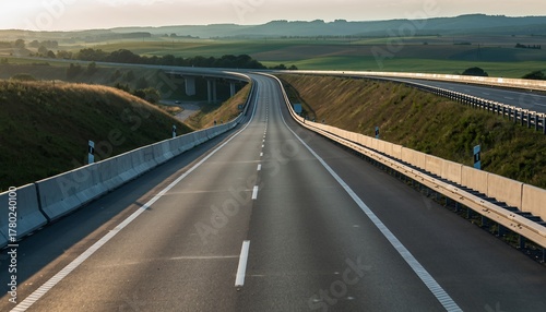 Empty Asphalt Highway with Green Fields and Bridge Landscape