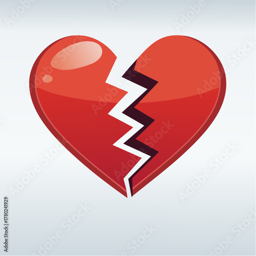 A red heart with a jagged white crack running down the middle, symbolizing heartbreak.
