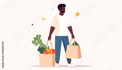 Man holding grocery bags filled with fresh produce and healthy food items.