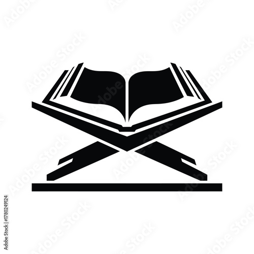 Black silhouette of an open quran on a stand