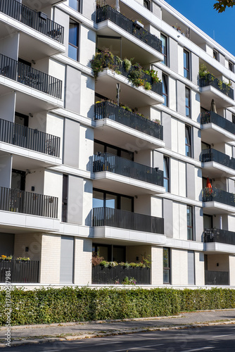 White multifamily residential building seen in Berlin, Germany