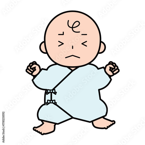 肌着を着たしかめっ面の赤ちゃん