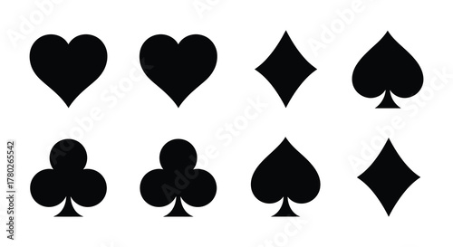 Black card suits hearts diamonds clubs and spades are displayed