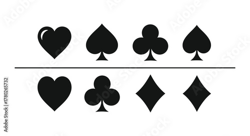 Black card suits hearts diamonds clubs and spades are displayed
