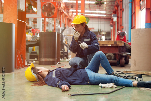 A female employee is helping her friend who was electrocuted in a metal cheese factory.
