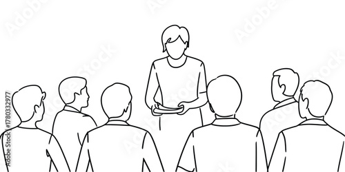 Business professional giving a presentation to a team meeting