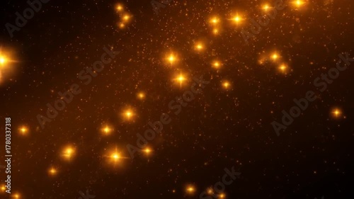 Elegant Gold Glitter Particles on Dark Background for Festive and Celebratory Designs