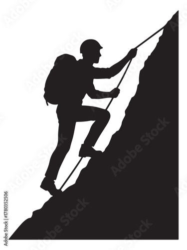 Silhouette of a mountaineer ascending a steep rocky cliff face