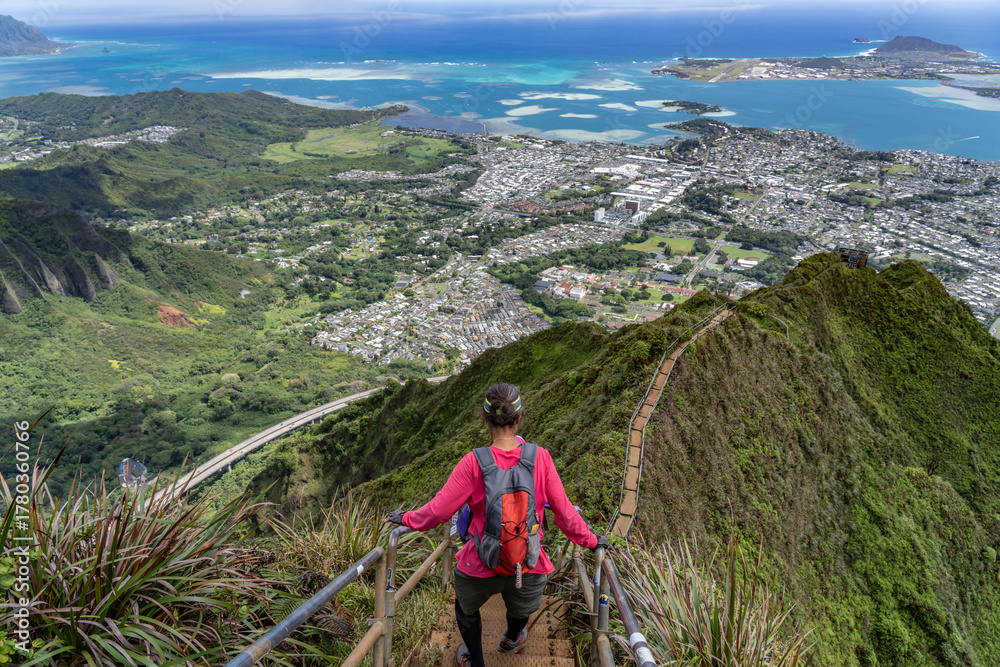 Naklejka premium Haiku Stairs (Stairway To Heaven), Honolulu, Oahu, Hawaii. Koʻolau Range, shield volcano. Kāneʻohe Bay is argest sheltered body of water in the main Hawaiian Islands. This reef-dominated embayment