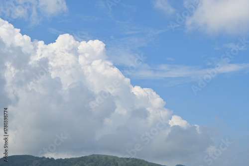 A beautiful cloudy vast sky summer landscape at the beach in Phuket, Thailand.